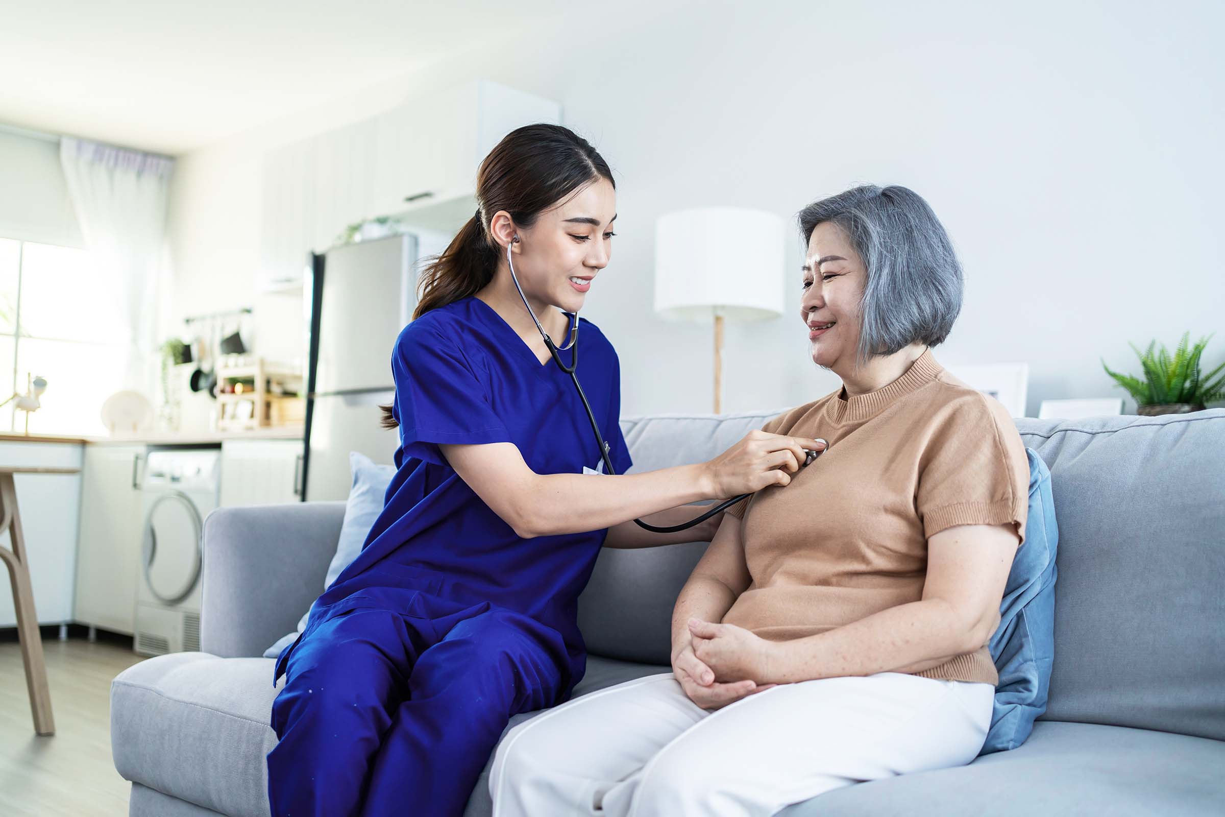 asian-nurse-at-nursing-home-take-care-of-disabled-JZWHW7J.jpg